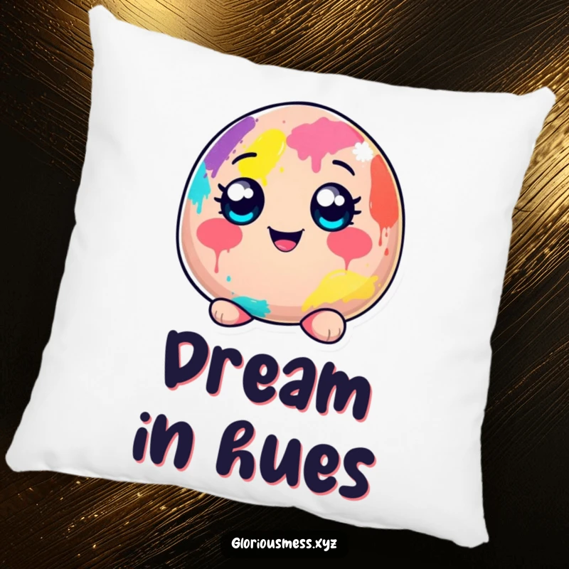 Funny pillow featuring a cheerful, wide-eyed blob character completely covered in a vibrant, colorful paint mess, adding artistic flair.