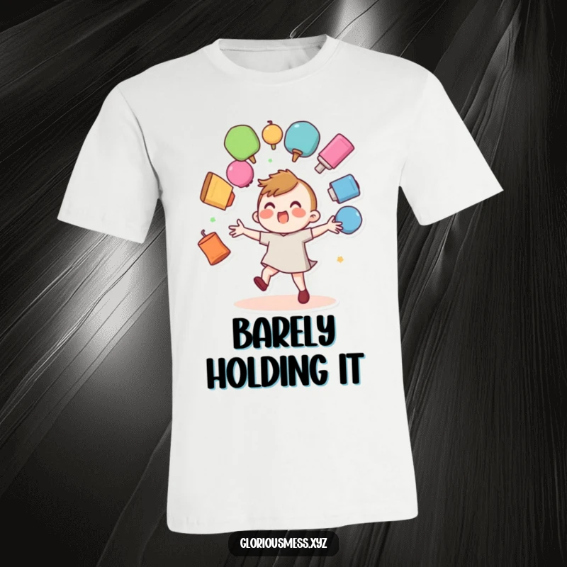 Funny t-shirt of a wobbly character perilously juggling many colorful objects, on the verge of disaster.