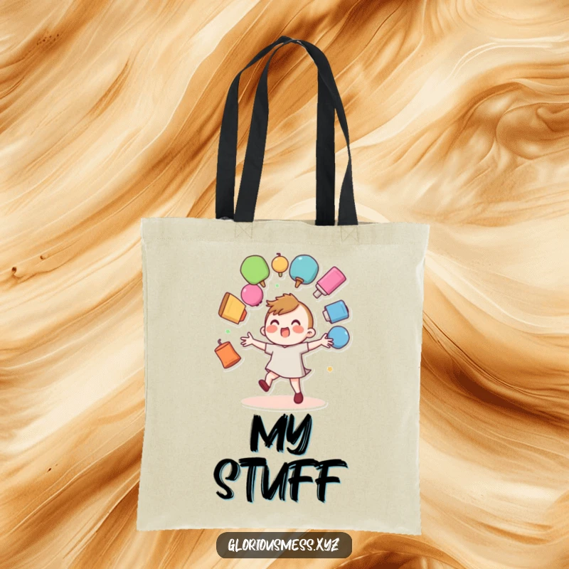 Funny tote bag showing a wobbly character struggling to juggle multiple colorful objects that are about to fall.