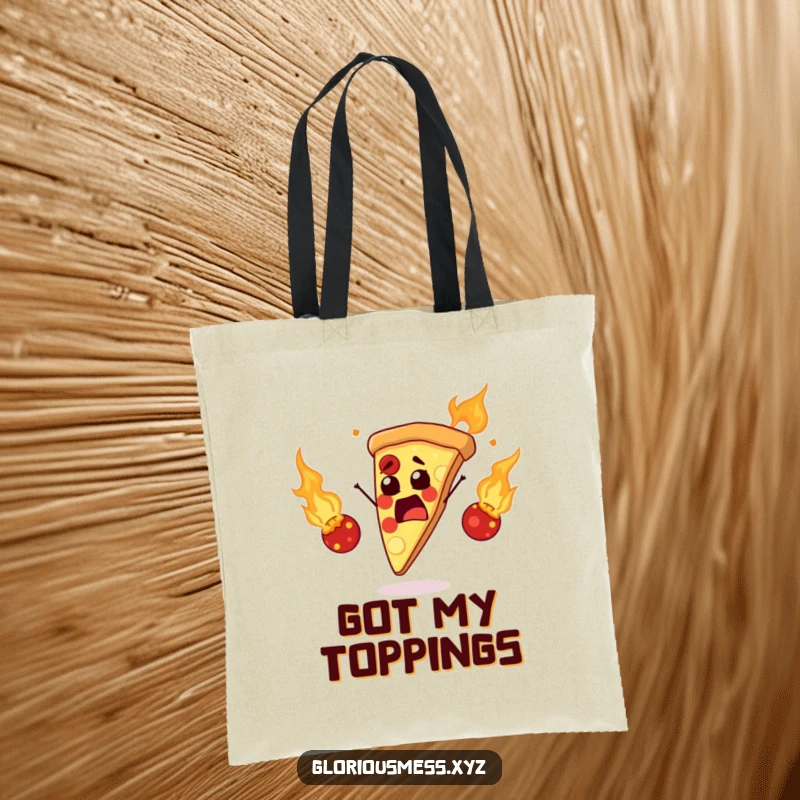 Funny tote bag illustrating a startled pizza slice juggling flaming meatballs, a humorous and practical accessory for daily use.